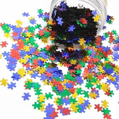 Die Cutting Printing PET Puzzle Glitter Shape for Eye-Catching Puzzle Designs in Red Blue Yellow Green Mix