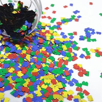 Die Cutting Printing PET Puzzle Glitter Shape for Eye-Catching Puzzle Designs in Red Blue Yellow Green Mix