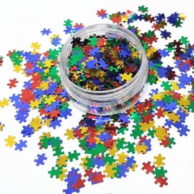 Die Cutting Printing PET Puzzle Glitter Shape for Eye-Catching Puzzle Designs in Red Blue Yellow Green Mix